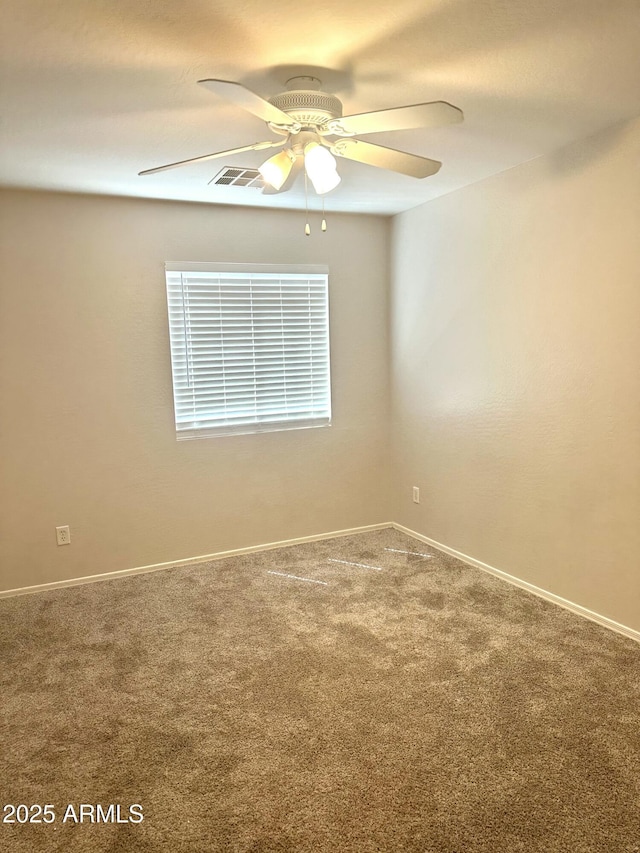 23284 W Pima St, Buckeye, AZ 85326 - carpeted empty room with a ceiling fan and baseboards