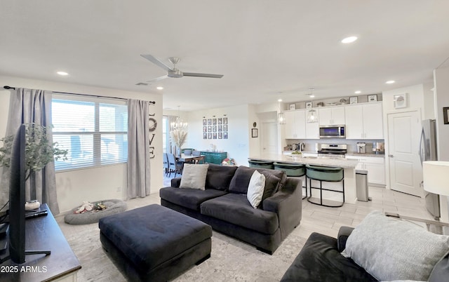 living room featuring ceiling fan