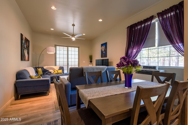 dining area with wood finished floors, ceiling fan, baseboards, and recessed lighting