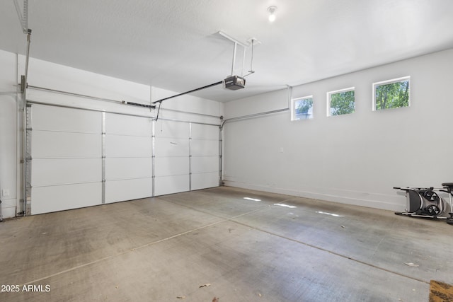 garage featuring a garage door opener