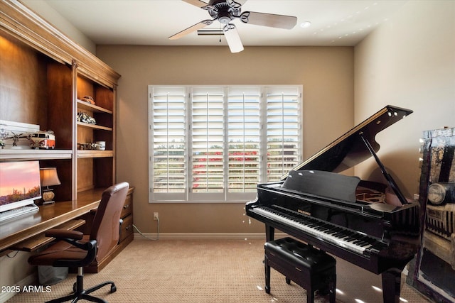 interior space with ceiling fan