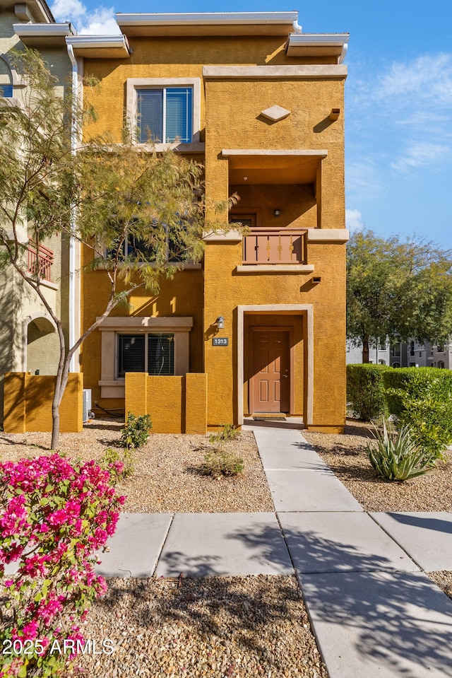 2150 W Alameda Rd Unit 1313, Phoenix, AZ 85085 - view of front of house with stucco siding and a balcony