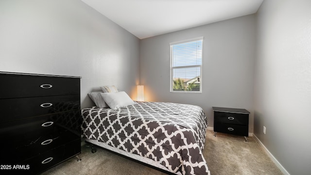 bedroom featuring light carpet and lofted ceiling