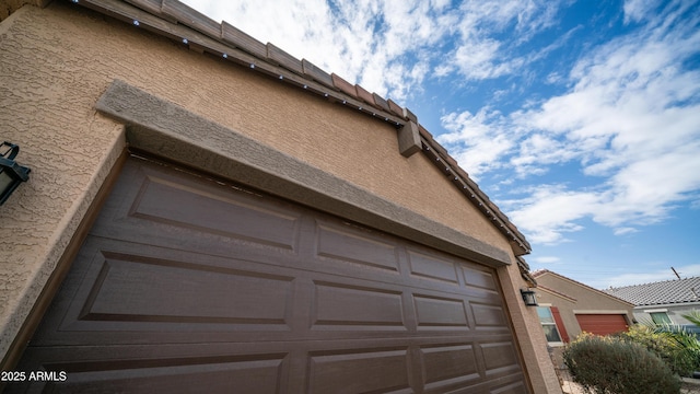 exterior space featuring a garage