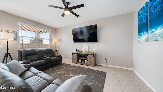 tiled living room with ceiling fan