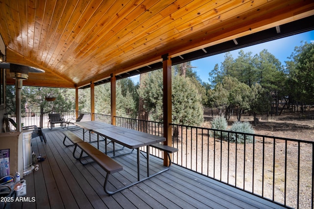 wooden deck with outdoor dining space