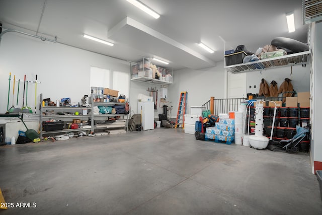 garage with a workshop area