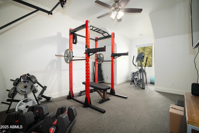 exercise room with ceiling fan and baseboards