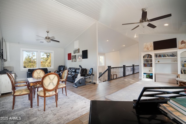 dining area featuring vaulted ceiling, wooden ceiling, wood finished floors, and a ceiling fan