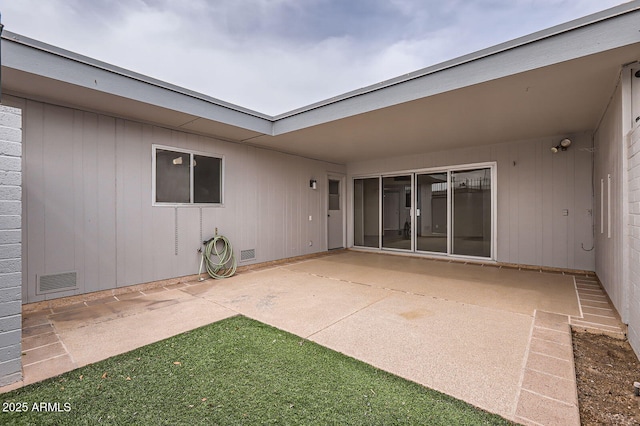 view of patio featuring visible vents