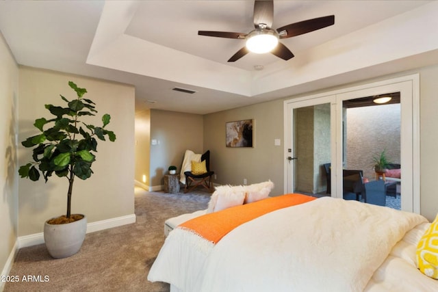 2110 W Navarro Ave, Mesa, AZ 85202 - carpeted bedroom with access to outside, a raised ceiling, and a ceiling fan