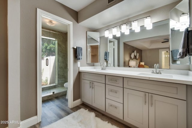 2110 W Navarro Ave, Mesa, AZ 85202 - full bath with double vanity, a stall shower, and wood finished floors