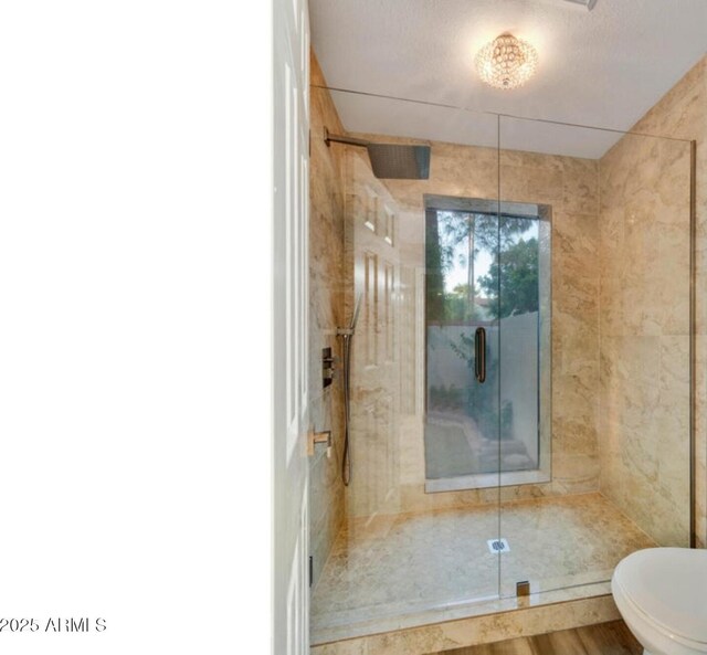 2110 W Navarro Ave, Mesa, AZ 85202 - bathroom featuring a stall shower and wood finished floors