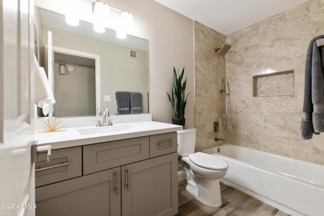 2110 W Navarro Ave, Mesa, AZ 85202 - bathroom with vanity, wood finished floors, and bathing tub / shower combination