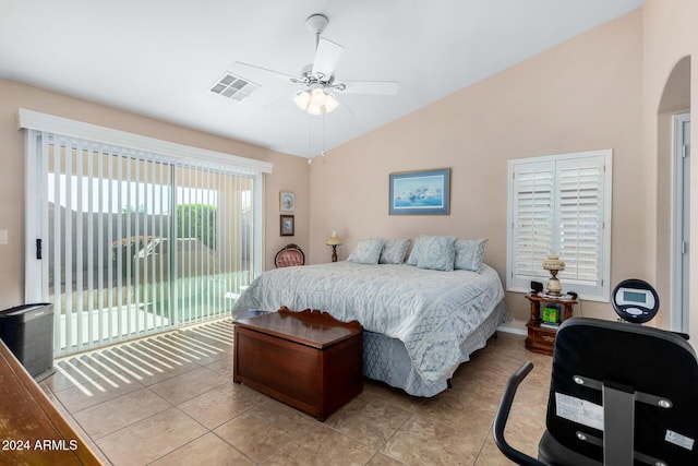 tiled bedroom featuring access to exterior, ceiling fan, and lofted ceiling