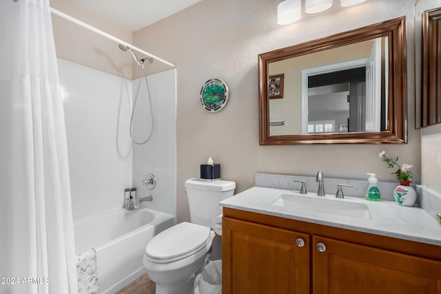 full bathroom with toilet, vanity, and shower / tub combo with curtain