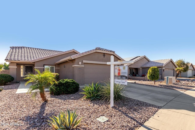 view of front of property featuring a garage