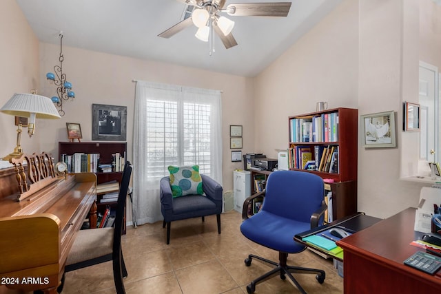 tiled home office featuring ceiling fan and lofted ceiling