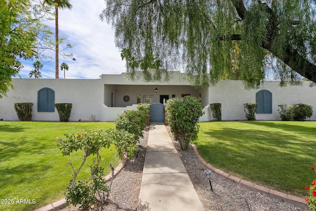 14802 N 3rd Ave, Phoenix, AZ 85023 - view of front of house with stucco siding and a front yard