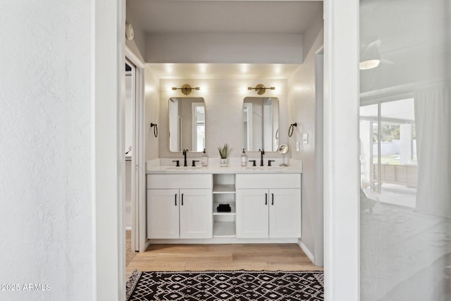14802 N 3rd Ave, Phoenix, AZ 85023 - full bathroom featuring double vanity, a textured wall, a sink, and wood finished floors