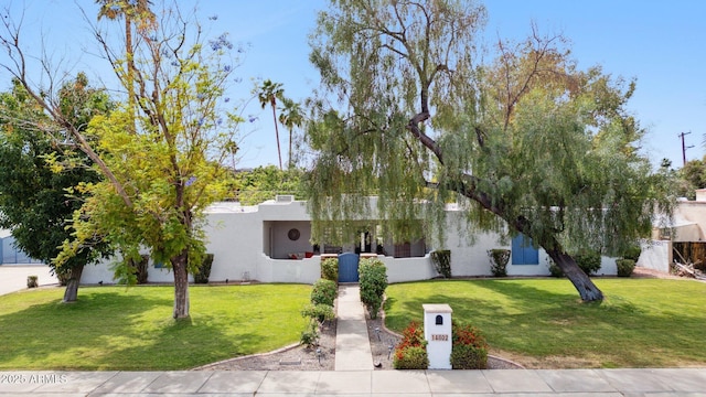 14802 N 3rd Ave, Phoenix, AZ 85023 - view of front facade featuring stucco siding and a front lawn