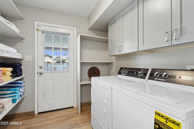 14802 N 3rd Ave, Phoenix, AZ 85023 - laundry room featuring light wood-style flooring, washing machine and dryer, and cabinet space