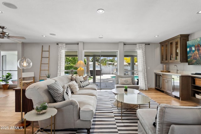 14802 N 3rd Ave, Phoenix, AZ 85023 - living room featuring indoor wet bar, recessed lighting, light wood-style flooring, and beverage cooler