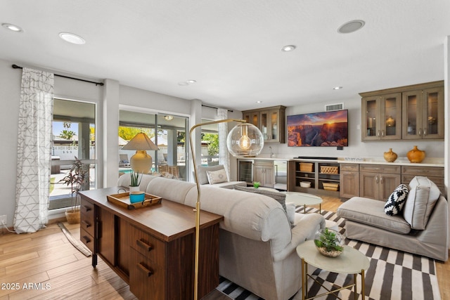 14802 N 3rd Ave, Phoenix, AZ 85023 - living area with beverage cooler, recessed lighting, light wood-type flooring, indoor bar, and visible vents