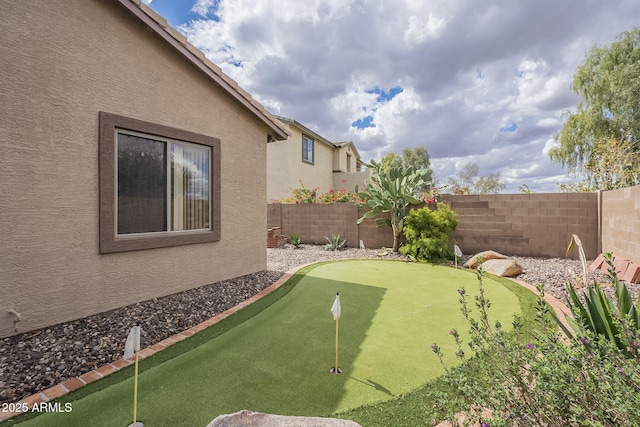 view of yard featuring a fenced backyard