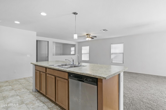 kitchen with a kitchen island with sink, light carpet, sink, stainless steel dishwasher, and ceiling fan