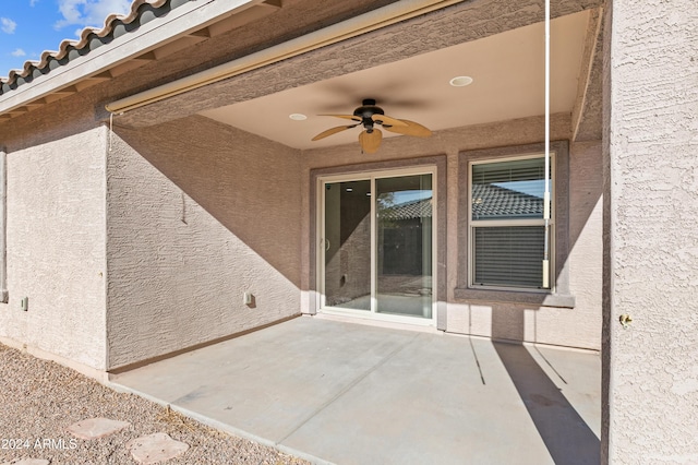 view of patio / terrace featuring ceiling fan