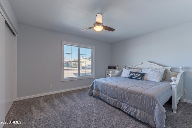 bedroom featuring ceiling fan, a closet, carpet flooring, and baseboards