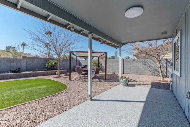 view of patio featuring a fenced backyard and visible vents