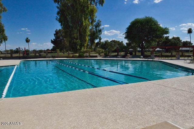 community pool featuring a patio area