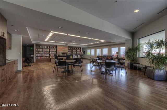 dining room featuring visible vents and wood finished floors