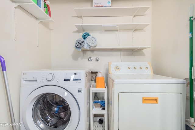 clothes washing area with independent washer and dryer