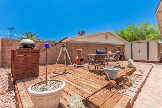 deck with a shed