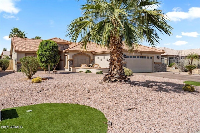 view of front facade with a garage, a tile roof, driveway, and stucco siding