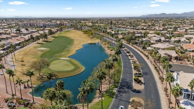 bird's eye view with a residential view and a water and mountain view