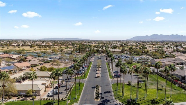 birds eye view of property featuring a mountain view and a residential view