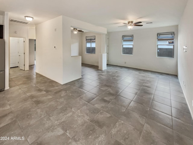 unfurnished room featuring ceiling fan