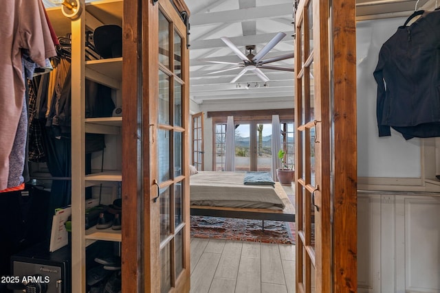 interior space with french doors and wood finished floors