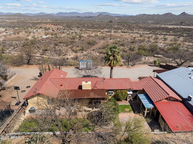 aerial view featuring view of desert and a mountain view