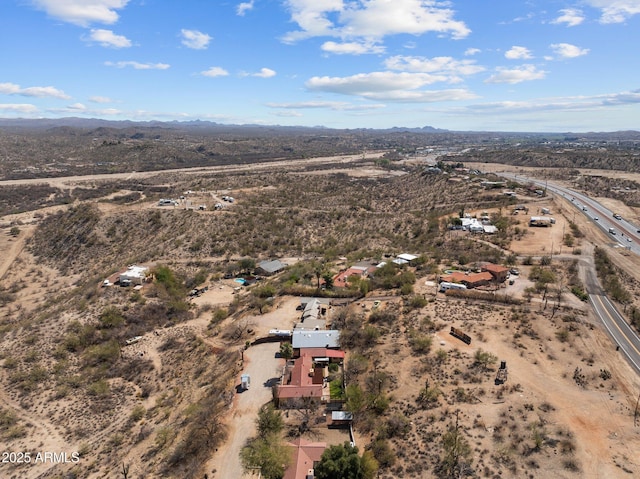 bird's eye view with a desert view