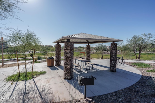 view of property's community featuring a gazebo and a patio area