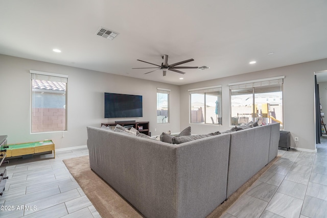 living room with ceiling fan