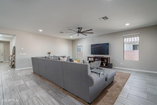 living room featuring ceiling fan