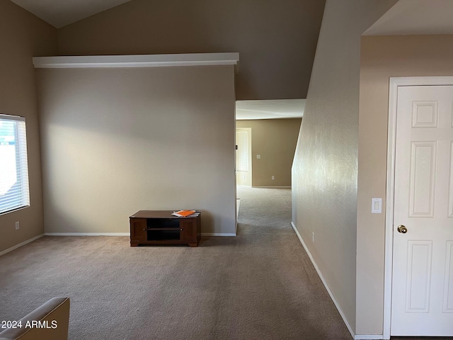 interior space featuring lofted ceiling