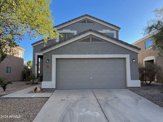 view of front of house with a garage