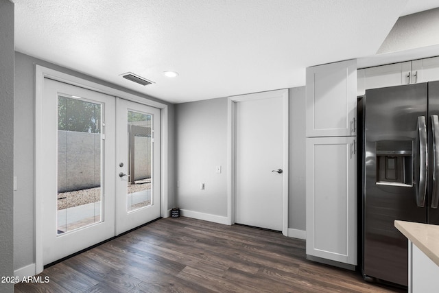 347 Leisure World, Mesa, AZ 85206 - entryway featuring french doors, baseboards, dark wood-style floors, recessed lighting, and a textured ceiling